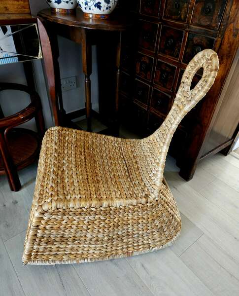Low Rocking Chair In Woven Banana Leaf Designed By Maria Vinka For