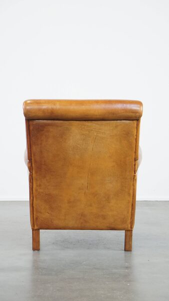 Comfortable, Neat Sheepskin Armchair, Neatly Finished With Black Piping And In Good Condition photo Furniture