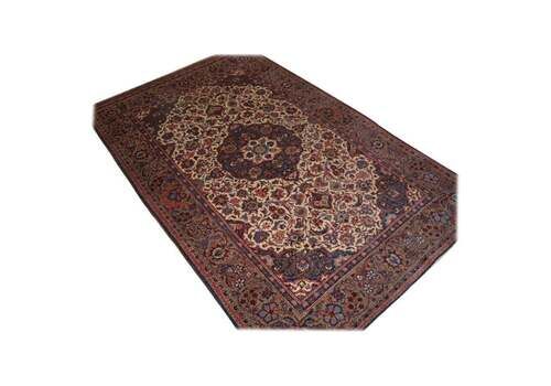 Antique Tabriz Rug Of Classic Floral Design With A Central Medallion On A Light