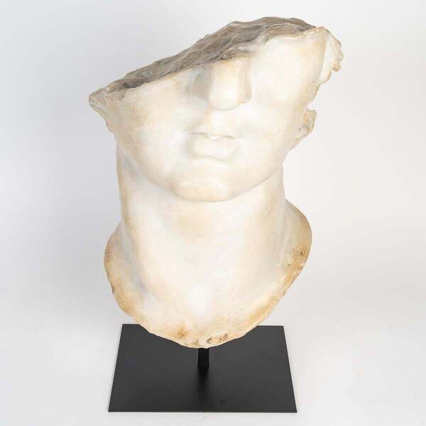 Sculpture Representing A Fragment Of The Bust Of Apollo. photo furniture