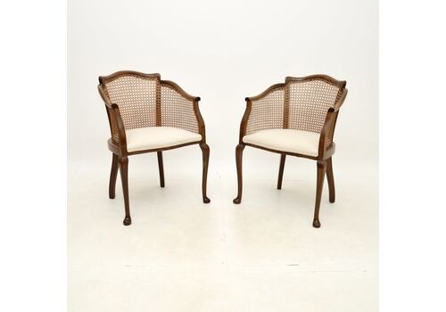 Pair Of Antique Edwardian Walnut Cane Back Armchairs