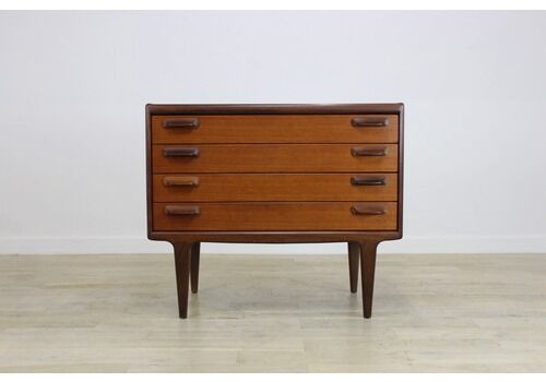 A Younger Sequence Teak Chest Of Drawers