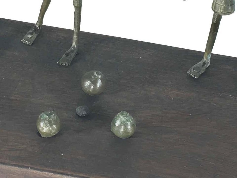 African Bronze Sculpture, With Characters Playing A Game photo furniture