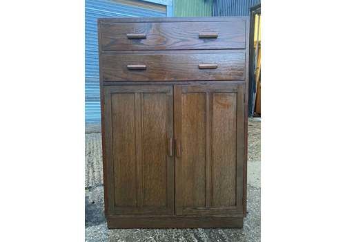 Mid Century Tallboy Oak Chest Of Drawers / Linen Cupboard In The Style Of Heals & Son Sold By Hunters Of Derby.