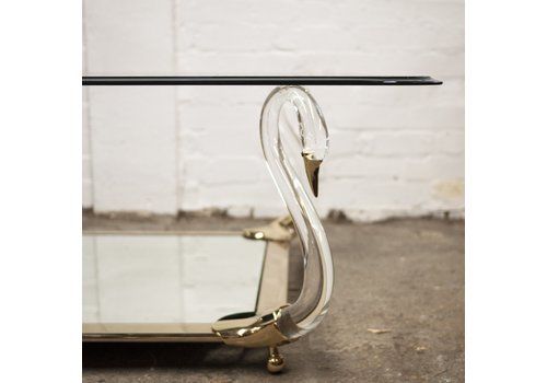 Hollywood Regency Lucite And Brass Italian Coffee Table With Four Carrying Swans And Glass Top, 1980s